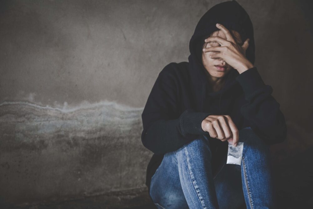 depressed woman going through cocaine withdrawal