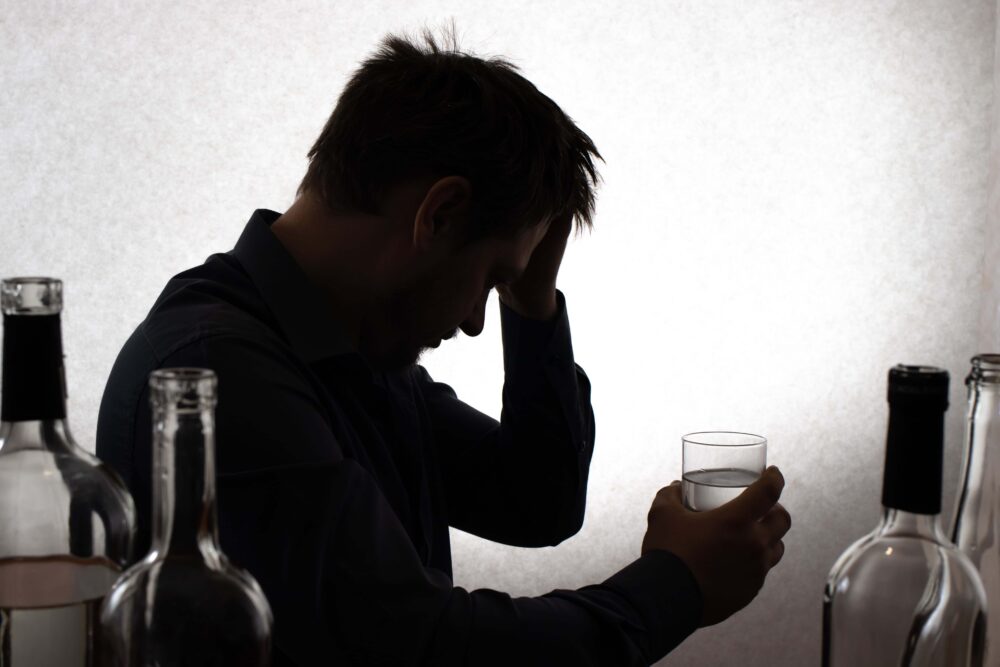alcoholic man suffering from delirium tremens