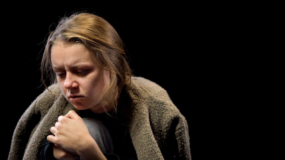 depressed woman suffering from drug withdrawal