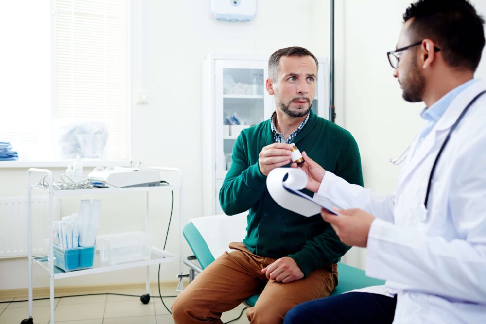 doctor handing patient medications for withdrawal